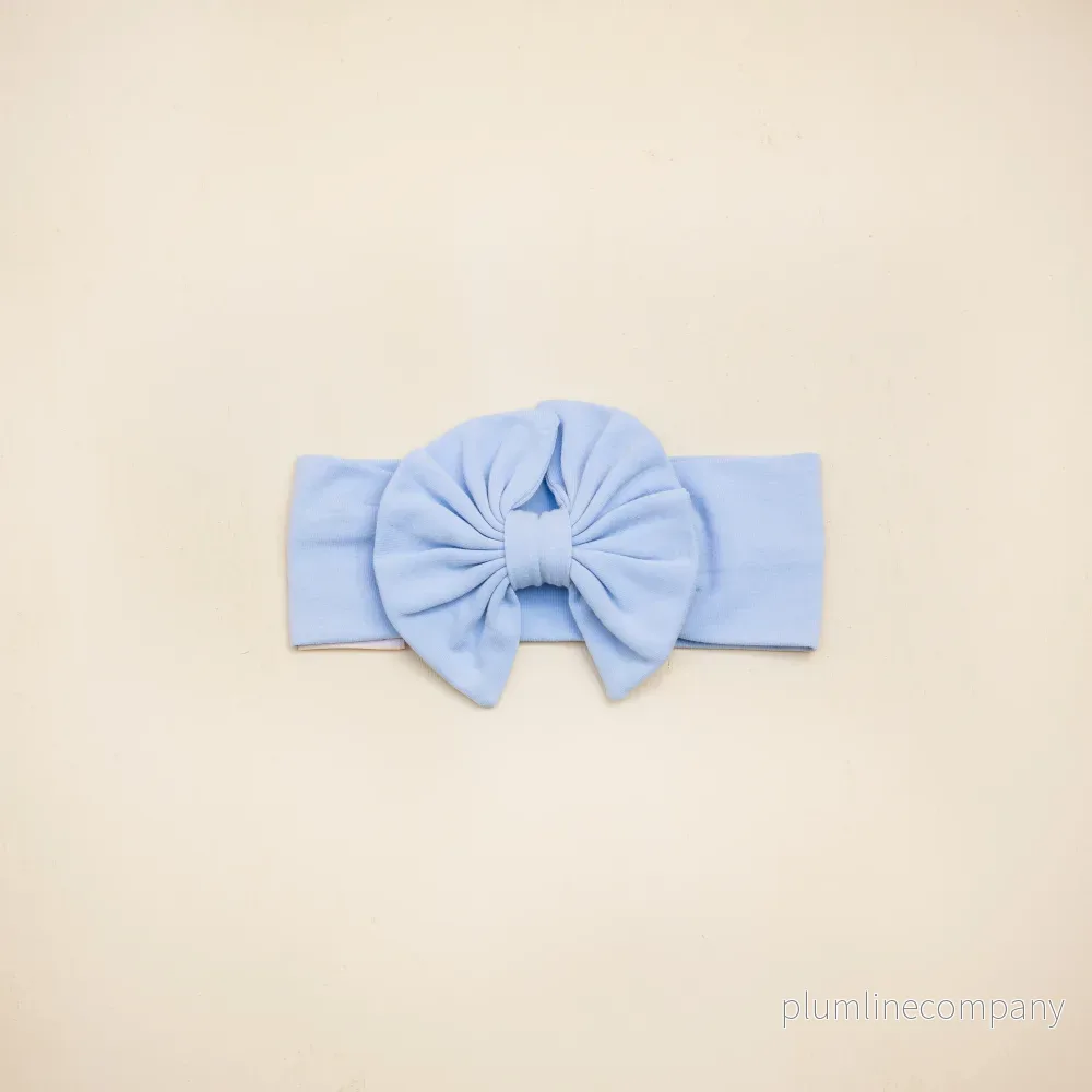 Lieveling Hårband med rosett i ekologisk bomull Sky Blue Lieveling Hårband med rosett i ekologisk bomull Sky Blue
